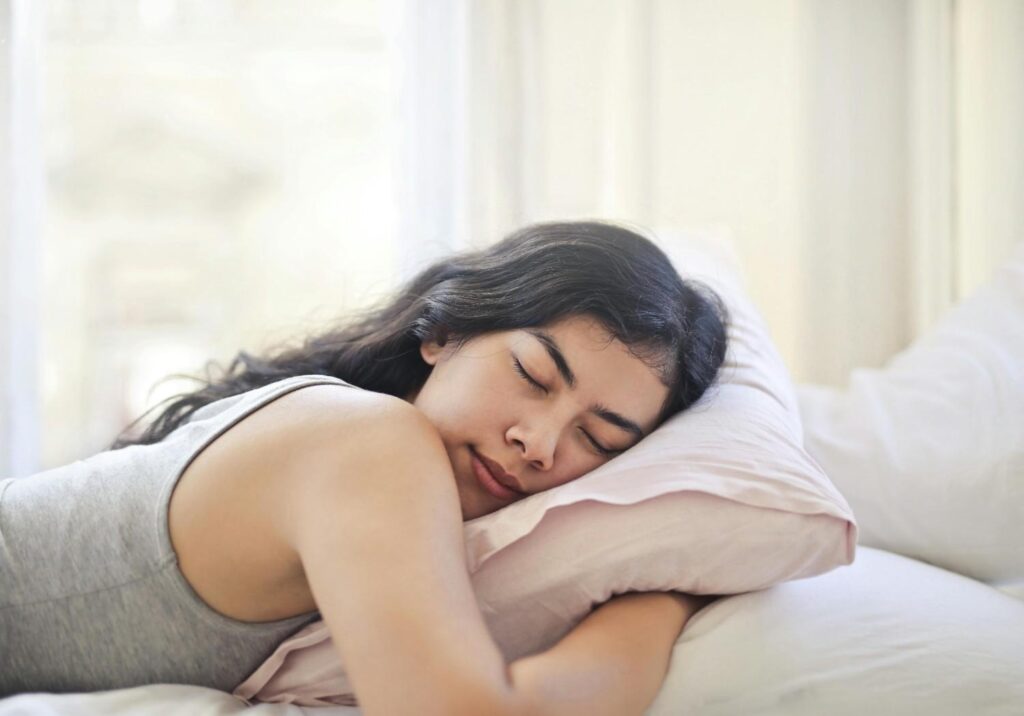 A peaceful individual in bed.